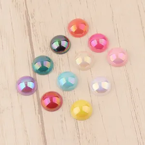 Detailed macro view of colorful 10mm acrylic flatback cabochons with AB finish.