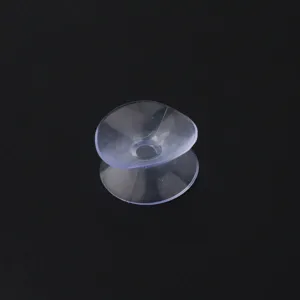 Transparent double-sided plastic suction cup hook with small hole for glass wall decor.