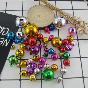 Colorful metal jingle bells for DIY jewelry making, bracelets, pet collars, and holiday crafts.