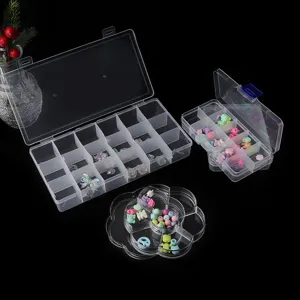 Clear plastic storage box detail, multi-compartment organizer for DIY craft beads.