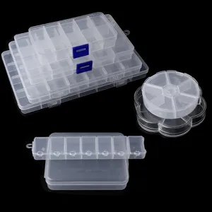 Transparent plastic storage box detail with multiple adjustable compartments and secure blue buckles.