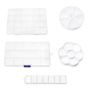 Clear plastic storage box detail, multi-compartment organizer for beads and small craft items.