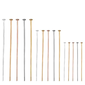 Detailed view of DIY jewelry metal headpins and t-pins in various metallic colors and sizes.