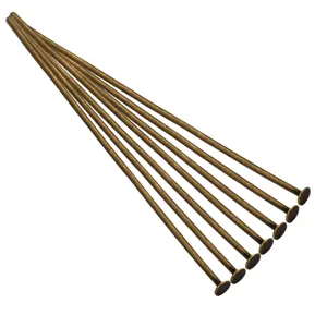 Bronze flat head pins and T-pins detail view for DIY handmade jewelry crafting and accessories.