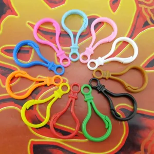 Colorful plastic lobster clasps and key chain hooks for DIY craft accessories and jewelry making.