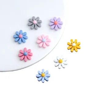 DIY colorful resin daisy flower cabochons for cute handmade hair clips and earrings jewelry parts.