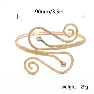 Gouden metalen armmanchet armband met strass details minimalistische bovenarm armband.