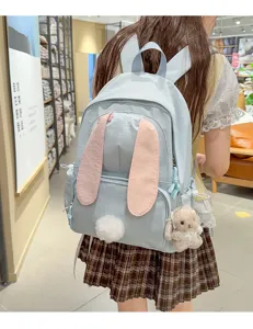Schattige konijnenoren rugzak voor meisjes, casual schooltas met pluche hanger.