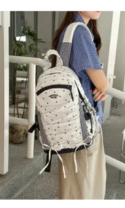 Japanse stijl gerimpelde grote capaciteit rugzak schooltas met stippen en strik detail.