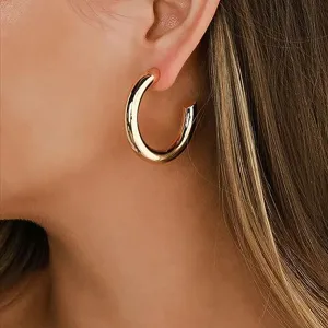 Elegante dikke gouden creolen voor vrouwen, minimalistische geometrische oorbellen.