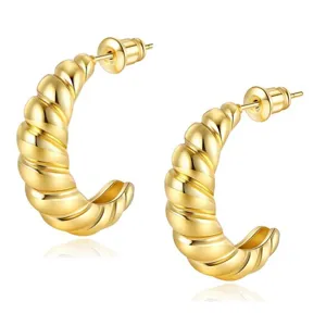 Grote gouden gedraaide oorbellen voor vrouwen, minimalistische geometrische oorringen.