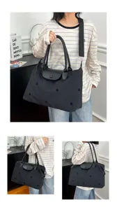 Large capacity nylon travel tote bag for women, lightweight folding shoulder handbag with stars.