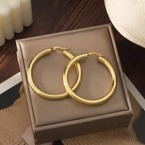 Chunky 18K vergulde dikke hoop oorbellen voor dames, modern minimalistisch hol ontwerp.