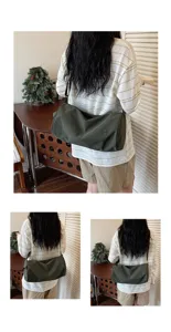 Gros plan détaillé montrant le sac à bandoulière cylindrique en nylon de grande capacité.