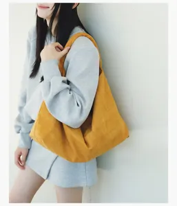 Casual slouchy yellow hobo shoulder bag for women, large capacity stylish tote handbag.