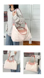 Large capacity travel bag, lightweight tote bag for women, commuter weekend luggage and daily bag.