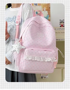 Japanese style pink star print backpack with cute lace pocket and pendant for student school.