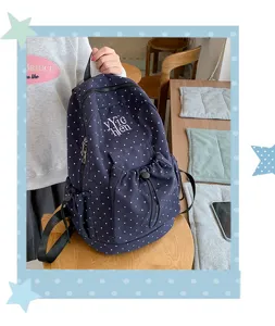 Casual polka dot student school bag, large capacity canvas backpack for daily use.