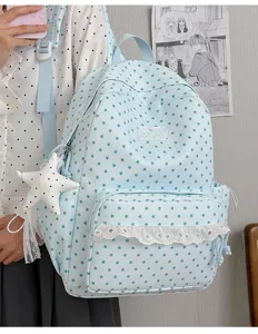 Detail view of Japanese style cute star print school backpack featuring delicate lace trim.