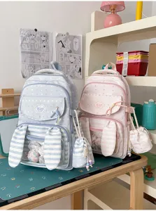 Schattige konijnenoren rugzak voor meisjes, pastel gestreepte schooltas met sterren en tasje.