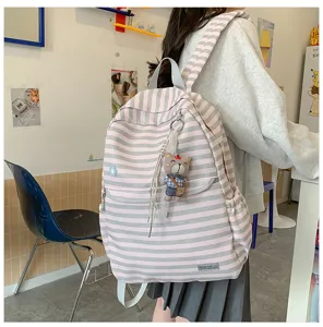 Japans minimalistisch roze en grijs gestreept canvas schoolrugzak met berenhanger voor kinderen