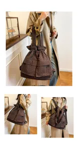 Stylish workwear drawstring backpack, brown plaid pattern, versatile daily shoulder and casual bag.