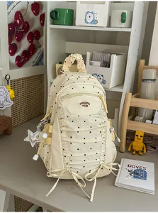 Japans stijl gestippelde rugzak detail, schattig rimpel ontwerp casual schooltas voor dagelijks.