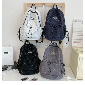 Large capacity casual student backpack with trendy polka dot pattern and multiple color options.
