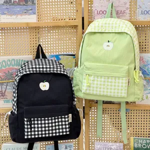 Sac à dos d'étudiant en toile à carreaux avec broderie de pomme, cartable tendance.