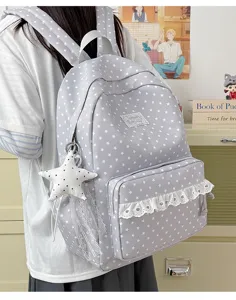 Grey star pattern school backpack with cute lace trim pocket and star pendant for students.