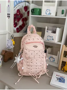 Roze gestippelde plooien rugzak detailweergave, grote capaciteit schooltas met leuke sterhanger.