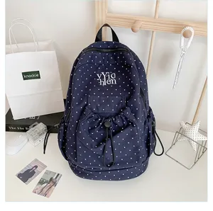 Casual navy blue polka dot backpack large capacity stylish school bag for students.