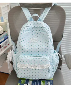 Japanese style cute light blue star print backpack with lace ruffle front pocket detail.