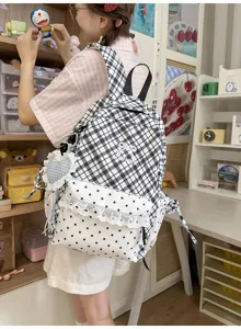 Japans stijl zwart-wit geruite schoolrugzak voor tienermeisjes met polkadottas.