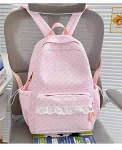 Pink star print school backpack with cute white lace trim for daily student campus use.