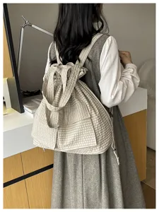 Casual plaid drawstring backpack, stylish oxford cloth travel daypack, versatile shoulder bag.