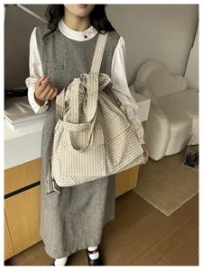Fashionable utility gingham drawstring backpack, casual oxford cloth travel shoulder bag.