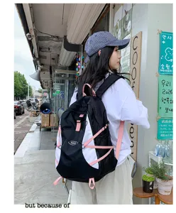 Lightweight folding hiking backpack for outdoor travel, cycling, and waterproof daypack details.