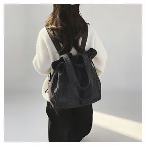 Detailed view of the stylish checkered drawstring backpack, perfect for daily casual and travel use.