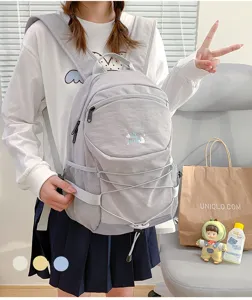 Casual large capacity grey school backpack for women, stylish niche design with drawstring.