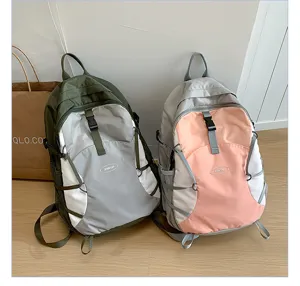 Detailed view of large capacity waterproof casual backpacks in dual-tone design for outdoor hiking.