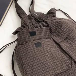 Brown plaid tactical drawstring backpack, versatile canvas daypack and casual shoulder bag.