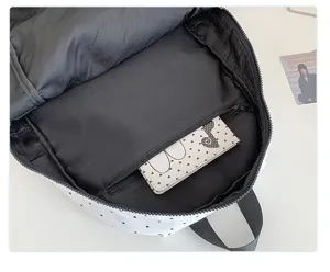 Detailed view of the casual backpack interior showing lining and zipper pocket for students.