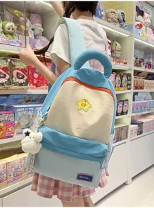 Cute Korean style student backpack with color block design, large capacity and star patch.
