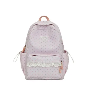 Pink star pattern canvas backpack with white lace front pocket, cute Japanese school bag for students.