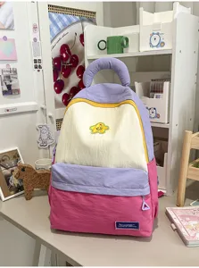 Cute Korean style student backpack, color block design, large capacity school bag for daily use.