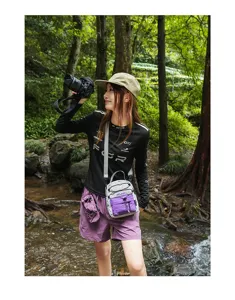 Bolso cruzado de viaje de nailon ligero impermeable con bolsillo de cordón para aire libre.