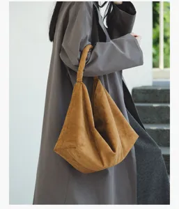 Details of casual suede underarm bag, retro slouchy shoulder tote for women daily wear.