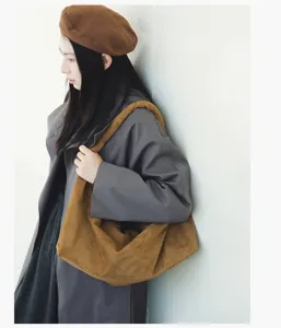 Casual slouchy suede shoulder bag for women, retro large capacity hobo tote bag daily use.
