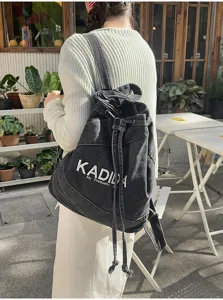 Vintage washed denim backpack for women, large capacity casual school bookbag stylish.
